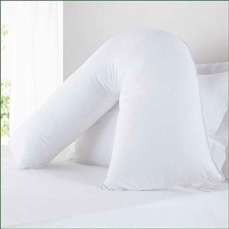 white v shaped pillow